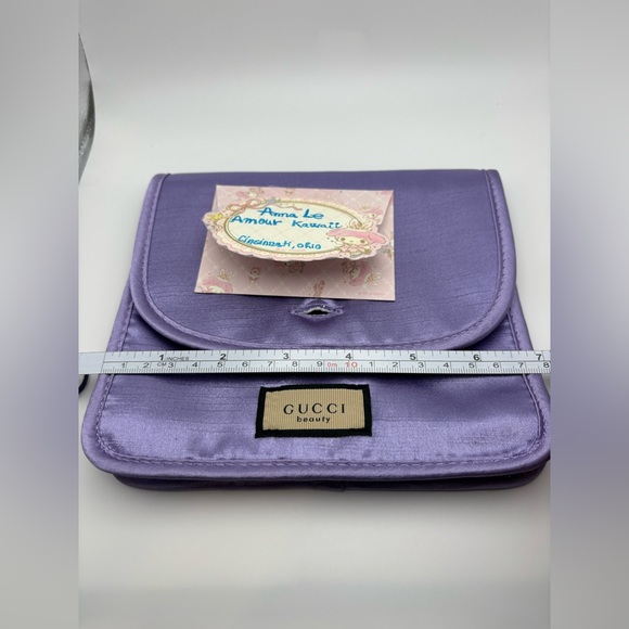 Gucci Round metal mirror with detail floral outside, and purple make up pouch - Picture 11 of 14